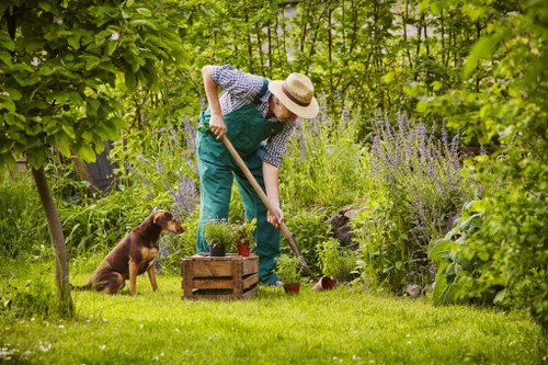 Team of gardeners preparing tools at the start of the day